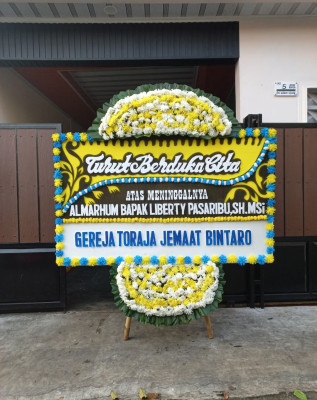 Papan Bunga Duka di Wangurer
